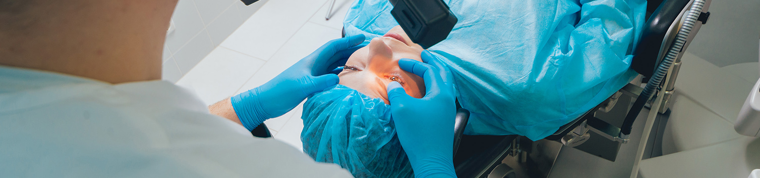 Doctor performing an eye procedure