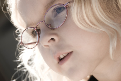 Child wearing glasses