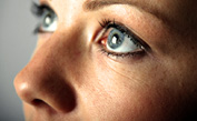 Closeup of a woman looking up